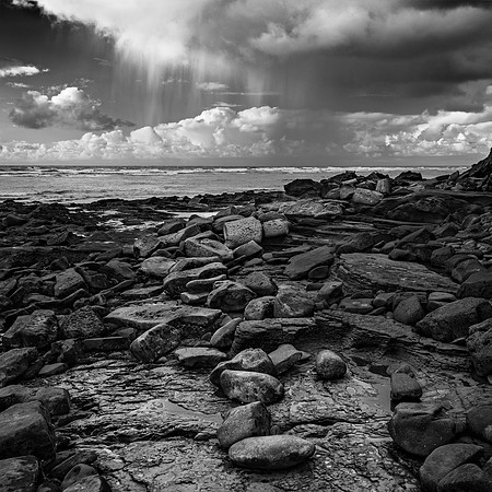 "Approaching Rain Sunset Cliffs"