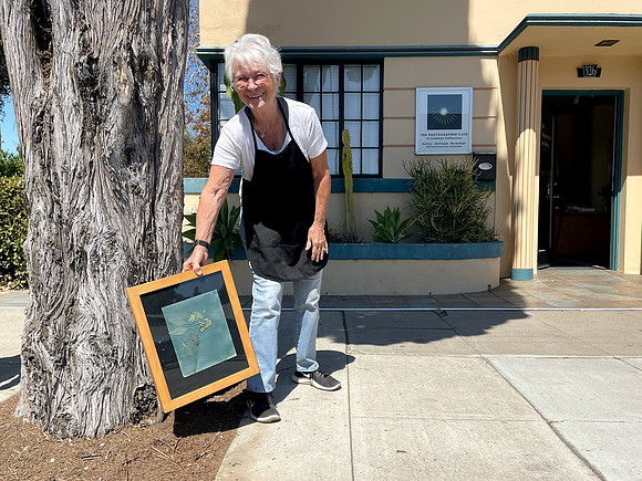 Collective Member Barbara making a cyanotype for World Cyanotype Day