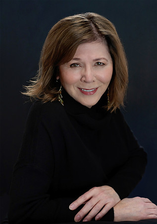 Priscilla Monger Heandshot